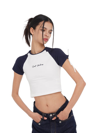 'NIFITY GIRL' CROPPED LACE-UP RAGLAN TEE